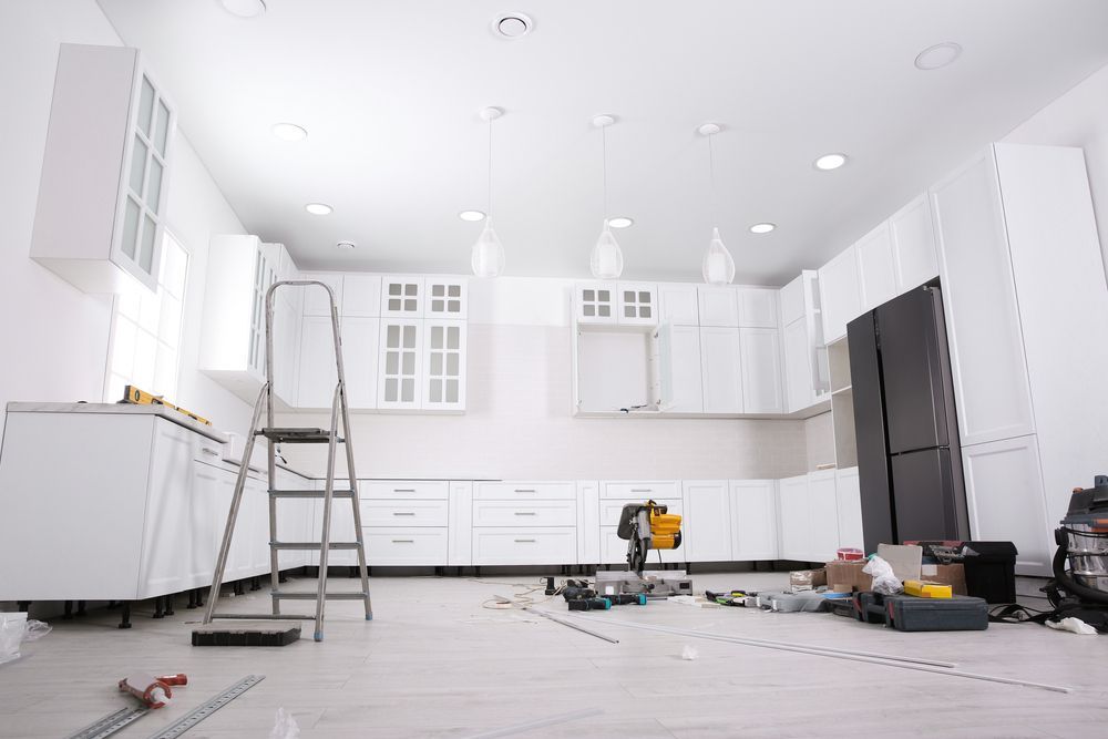 White Kitchen Under Renovation with Cabinets — Platinum Kitchens & Bathrooms in Grafton, NSW