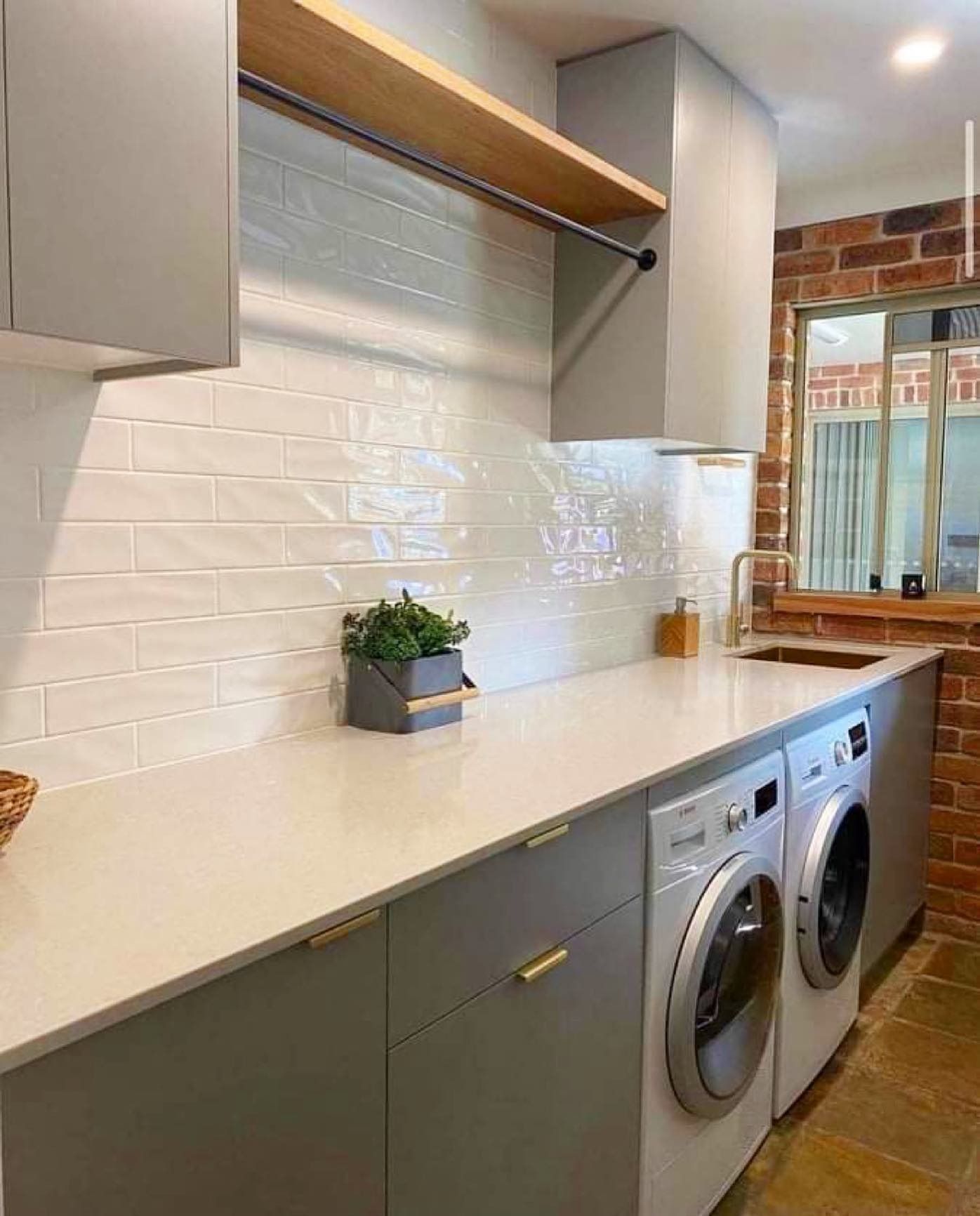 Modern Laundry Room with Gray Cabinets — Platinum Kitchens & Bathrooms in North Boambee Valley, NSW