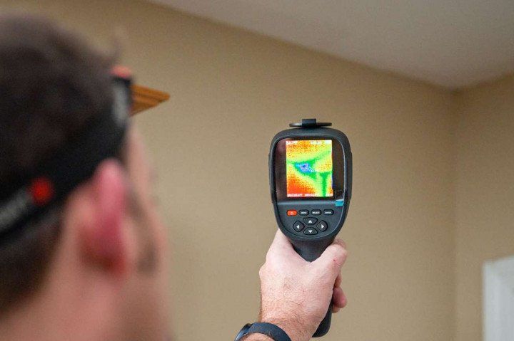 Man Checking The Ventilation Of The House