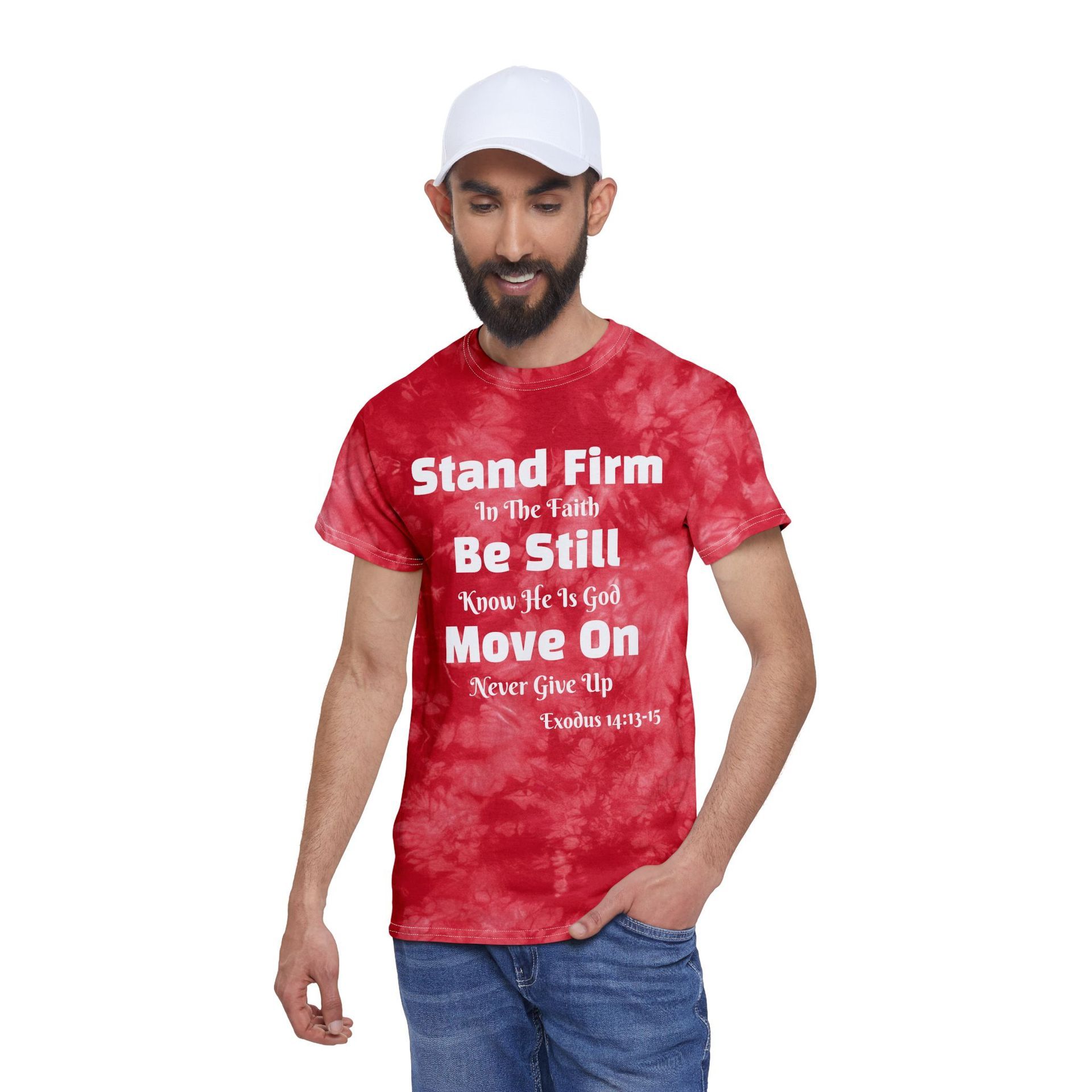 Man wearing a red tie-dye t-shirt with white text, a white cap, and blue jeans.