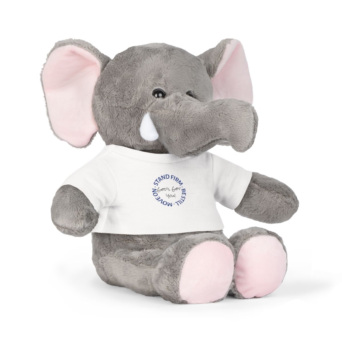 Gray plush elephant wearing a white t-shirt with a blue circular graphic.