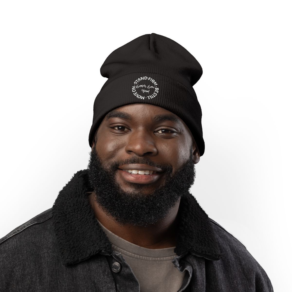 Man wearing a black t-shirt with text: