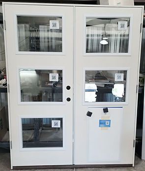 White double doors with glass panels and a partially visible interior.