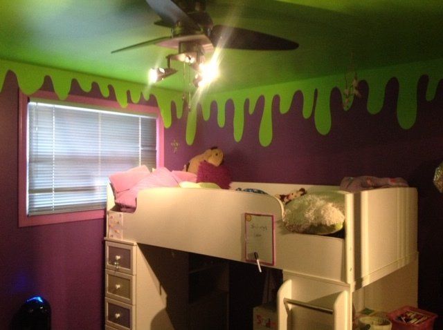 Purple bedroom with green slime-painted ceiling, loft bed, ceiling fan, and window blinds