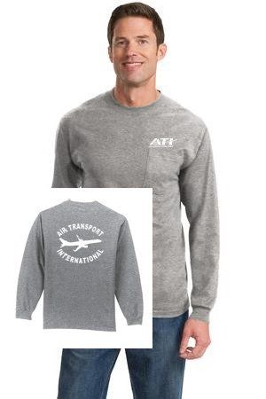 A man wearing a grey long-sleeved shirt with an