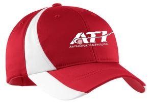 A red baseball cap with white side panels and the white