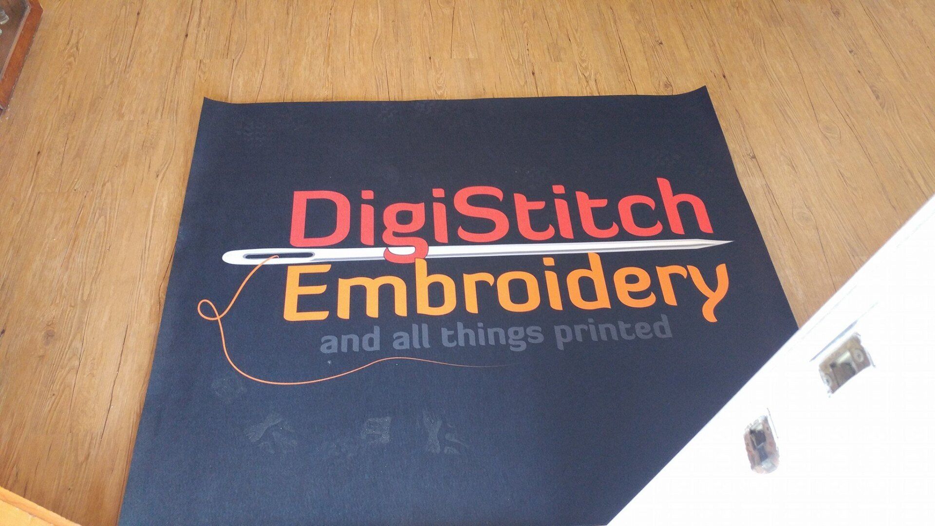 A black fabric patch with