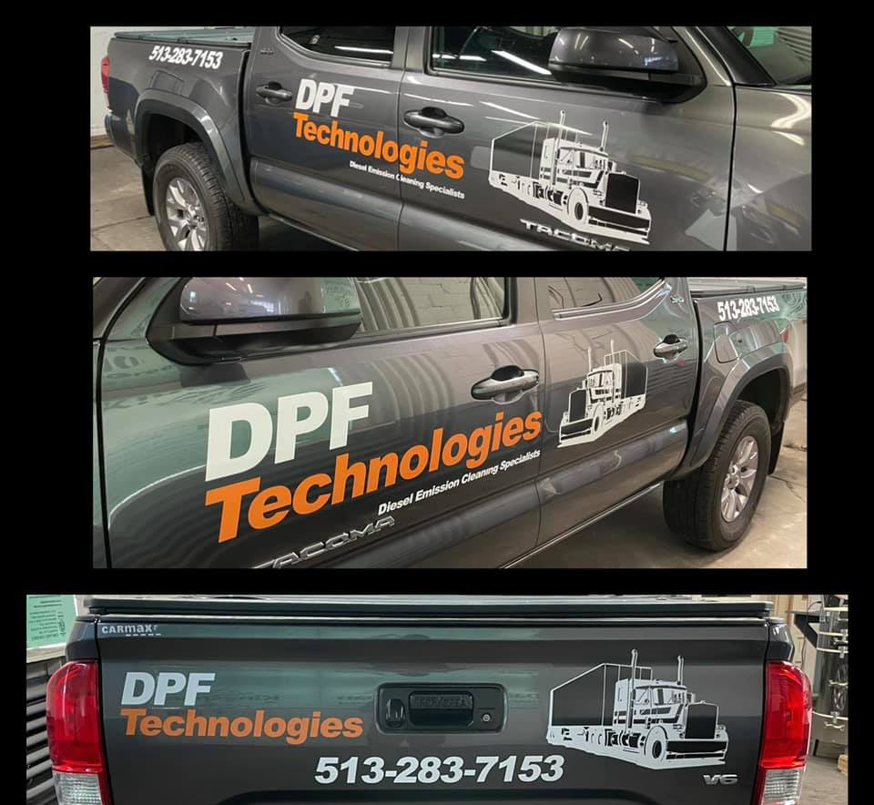 A gray truck branded 