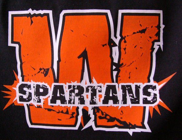 A distressed orange letter