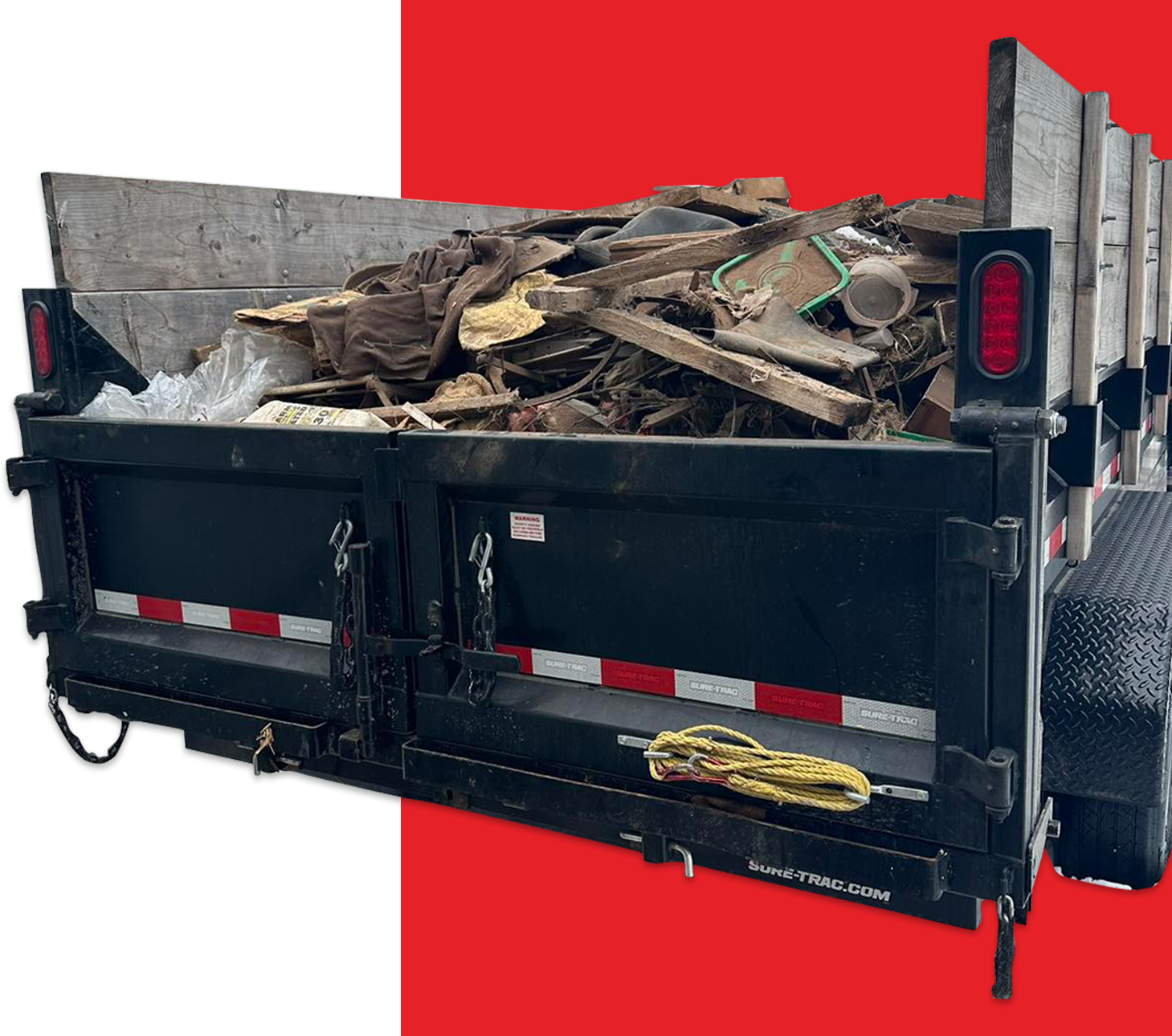 A dumpster with a bunch of trash in it