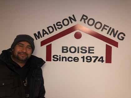 Man smiling next to a