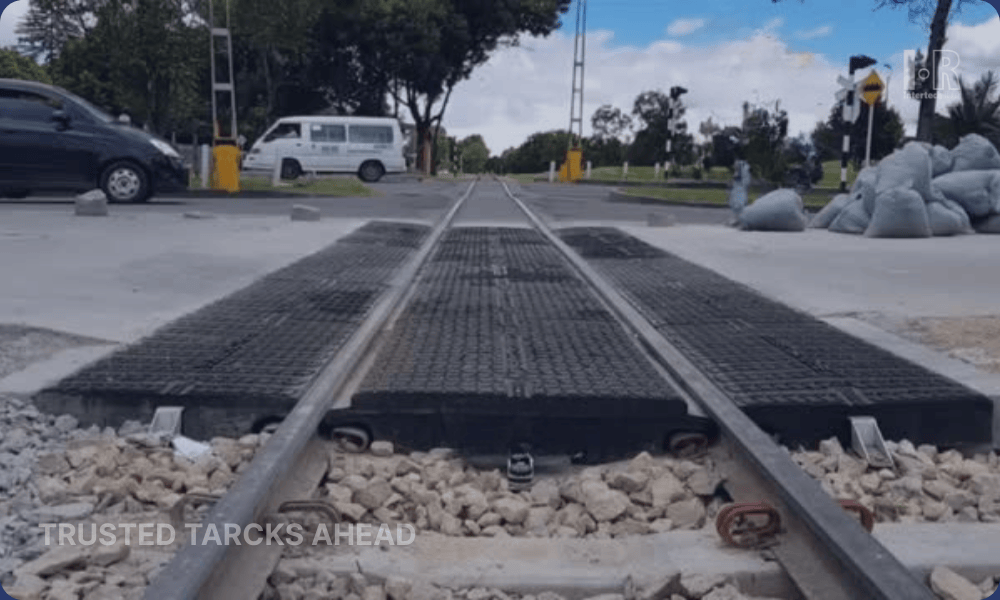 Level crossing safety equipment with barriers, warning lights, semaphores, and train detection systems