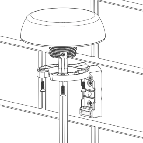 Installation of a shower head mount on a wall with screws.