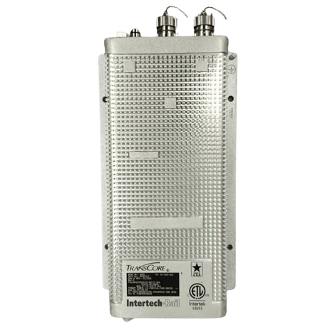 Silver Intertech EMI TRANS ZON E device, with top cables and label, on white.