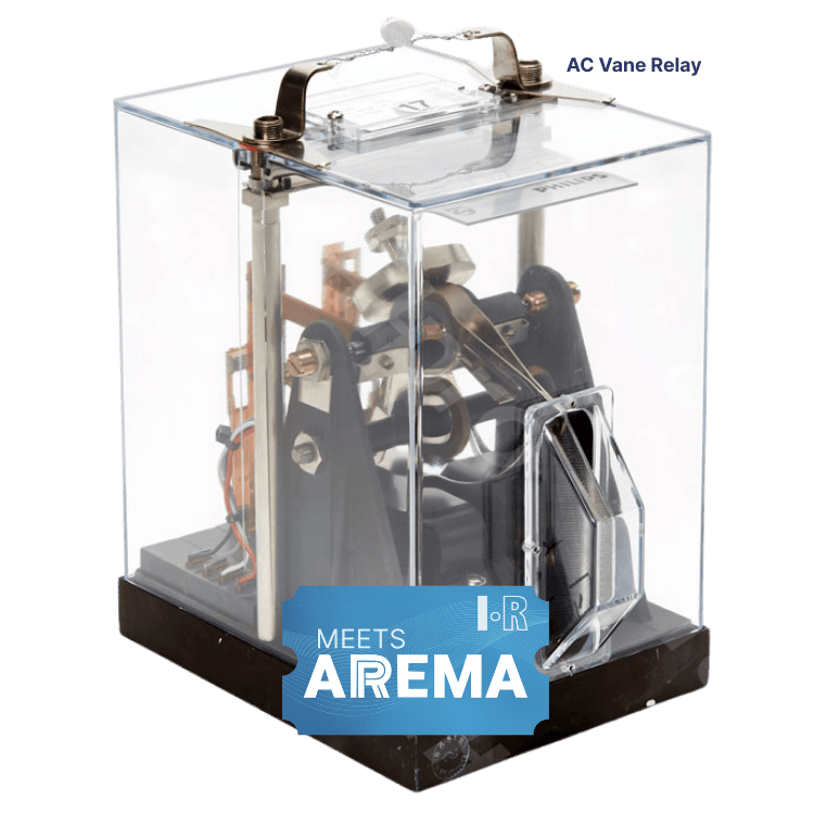 An AC Vane Relay encased in a clear plastic housing, marked with an AREMA compliance label.