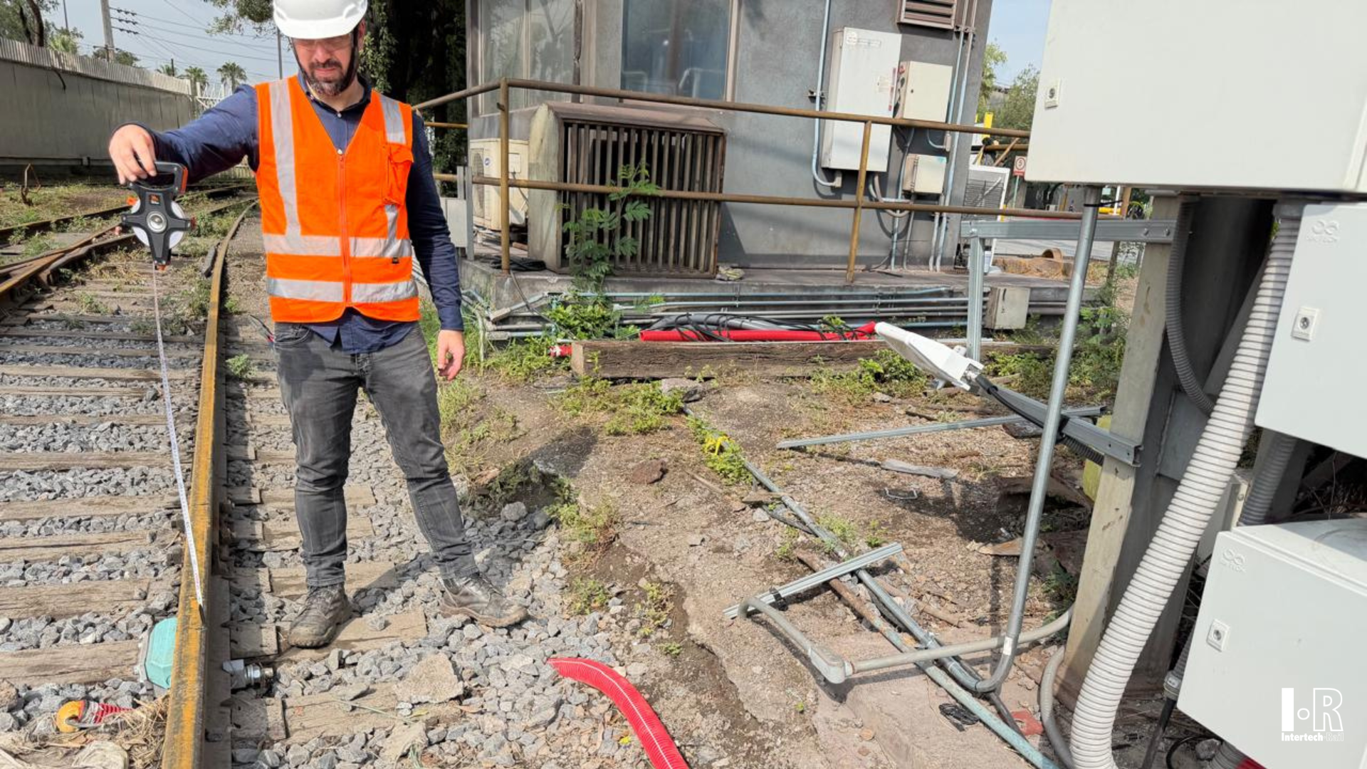 Wheel sensor detecting railcar axle at trackside AEI station