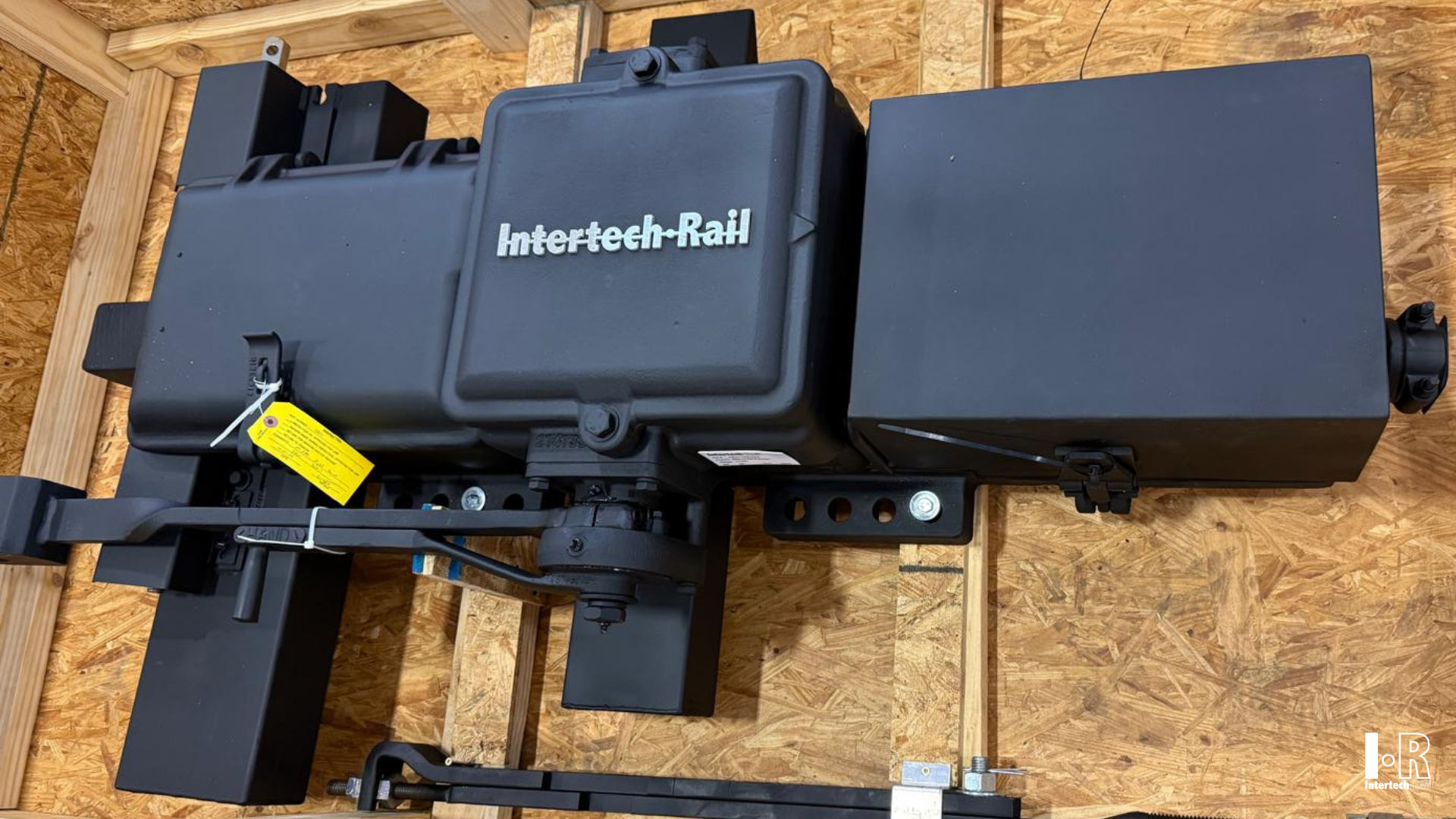IRM23 switch machine by Intertech Rail secured inside a wooden shipping crate.