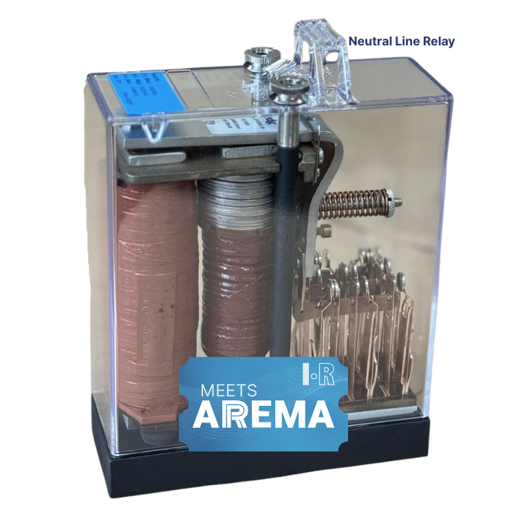 A Neutral Line Relay encased in a clear plastic housing with copper-colored coils and a blue 