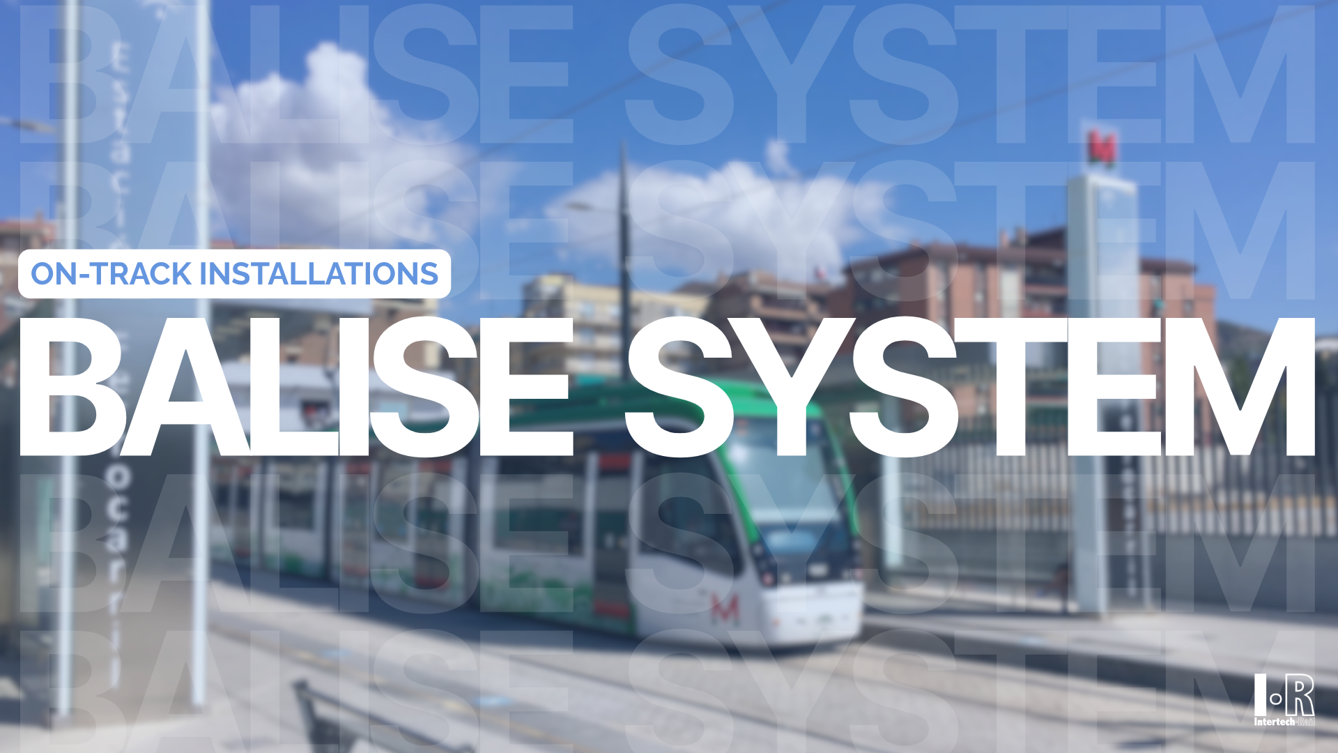 Modern tram on tracks in a city transit corridor with large “BALISE SYSTEM” text overlay. Balise System