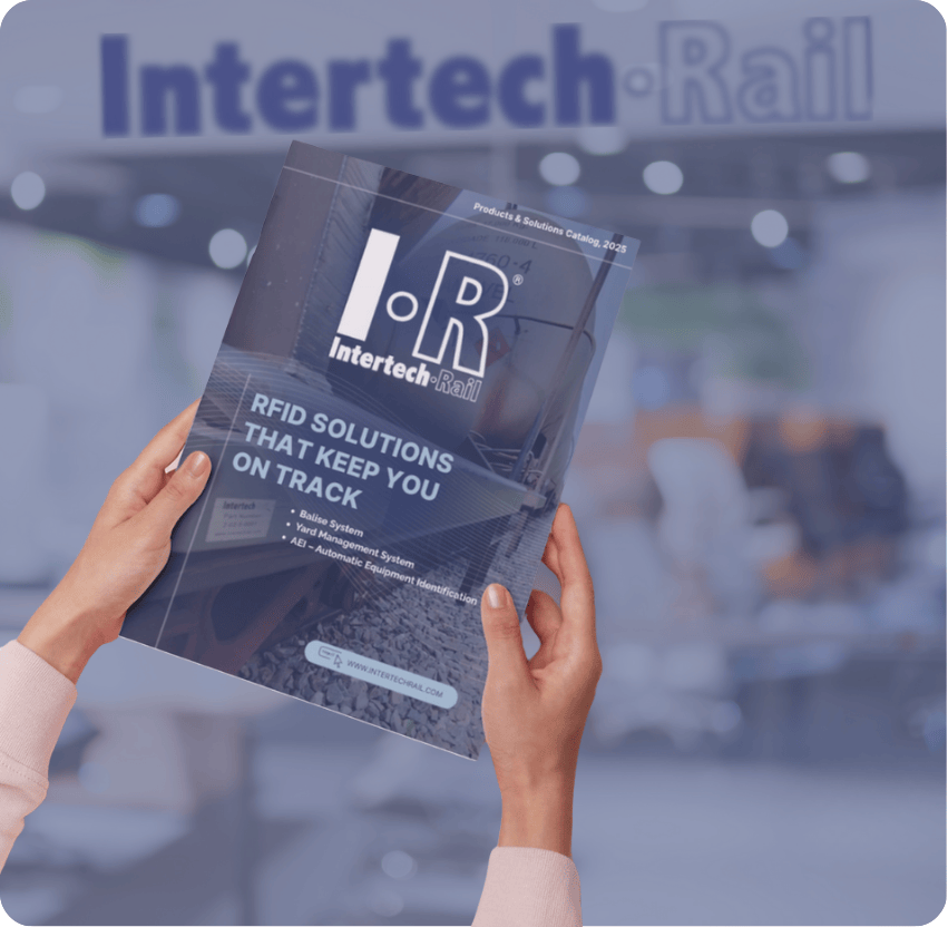 Hands holding an Intertech Rail brochure, with text: RFID solutions that keep you on track.