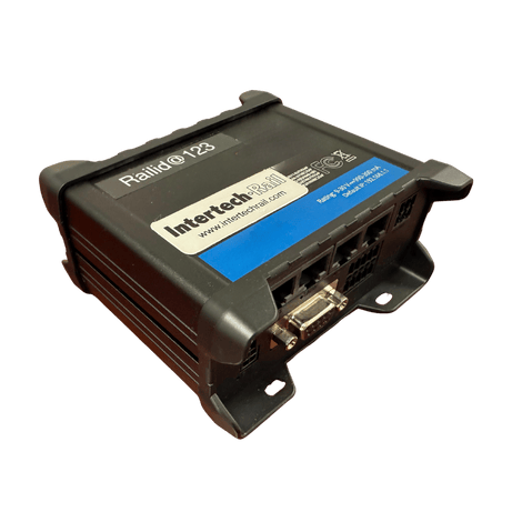 Black Intertech Rapid 123 industrial router with blue and white labels, various ports, and mounting brackets.