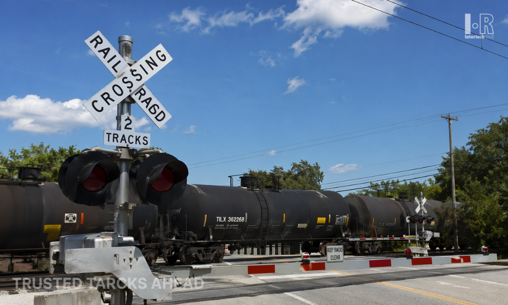 Railway level crossing with barrier and signaling system ensuring road safety
