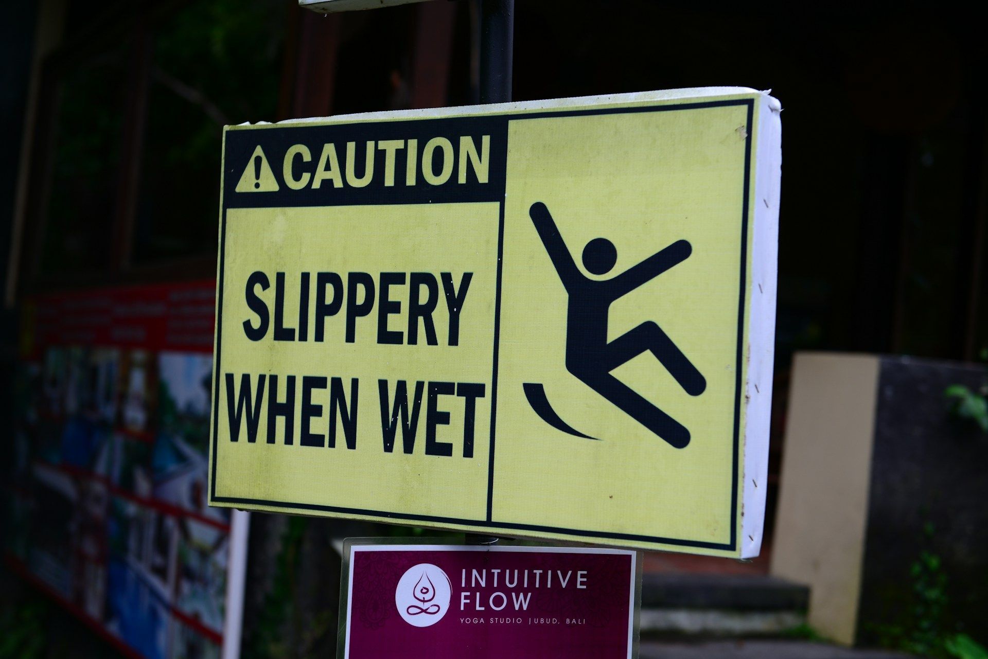 Yellow caution sign warns 