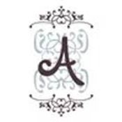 Decorative black letter “A” with ornate gray scrollwork and flourishes
