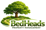 Logo for BedHeads Property Management with a green oak tree on a grassy hill over the company name in green text.