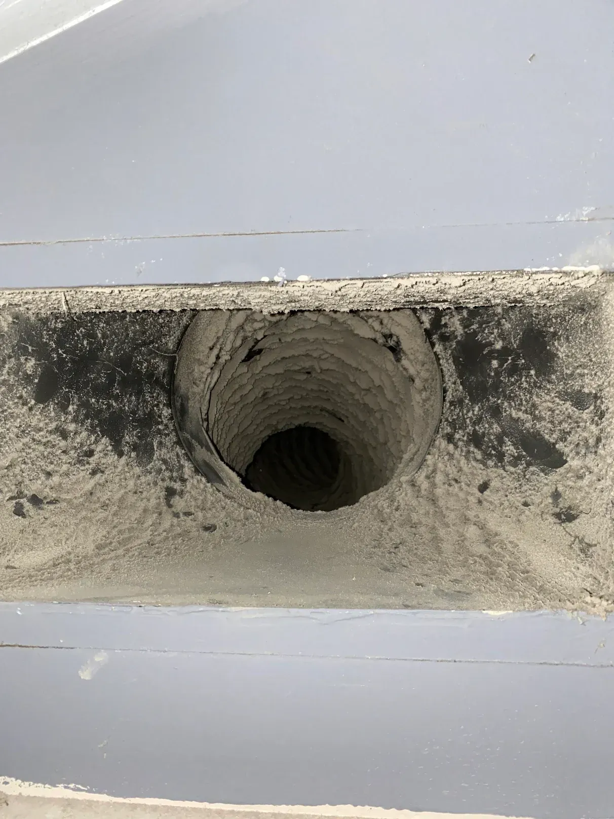 There is a hole in the wall that looks like a hole in the ground.
