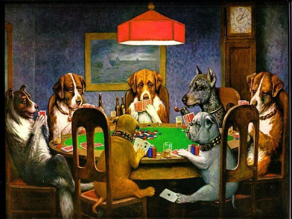 Dogs playing poker around a green felt table, lit by a red lampshade.