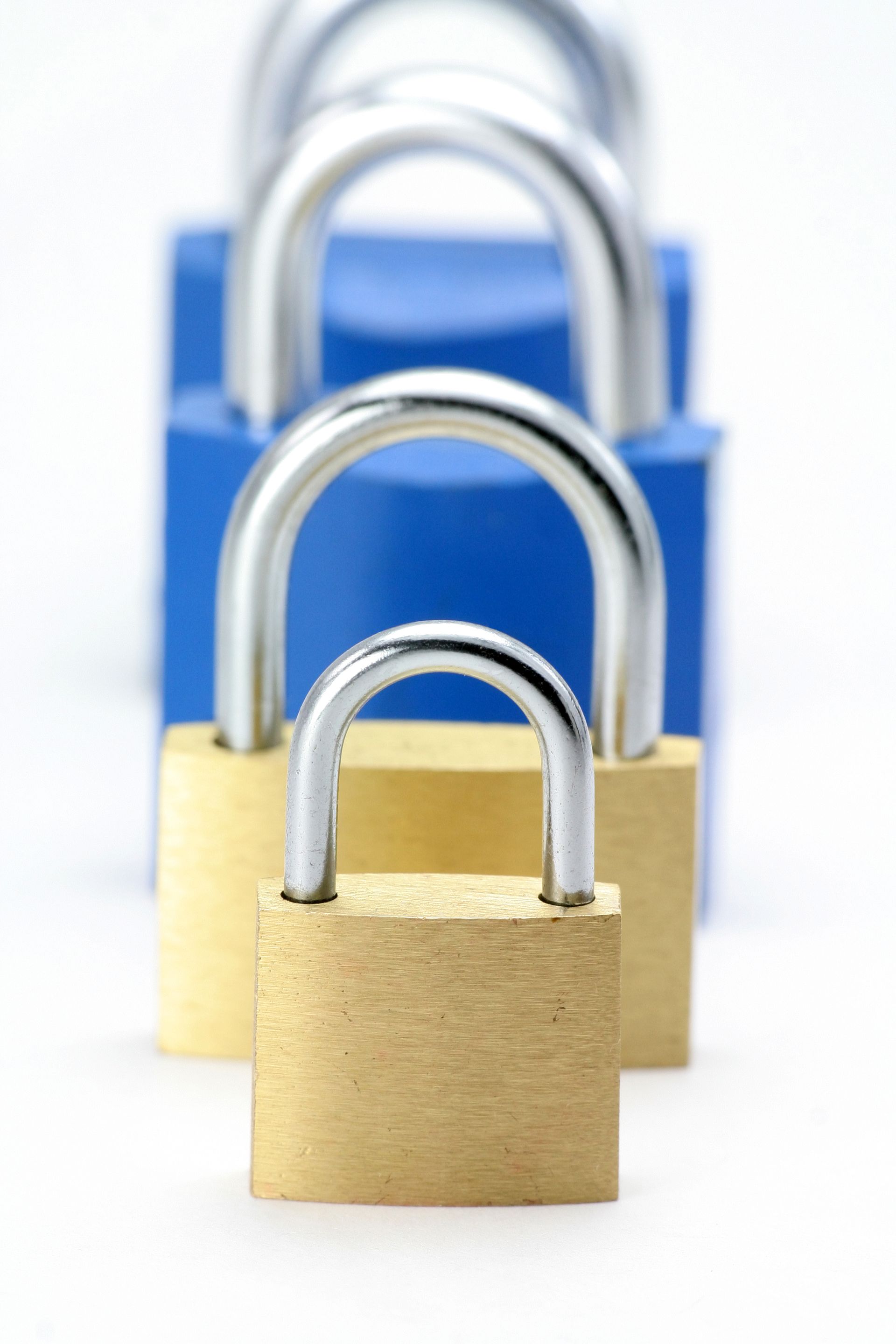 A row of padlocks are lined up in a row