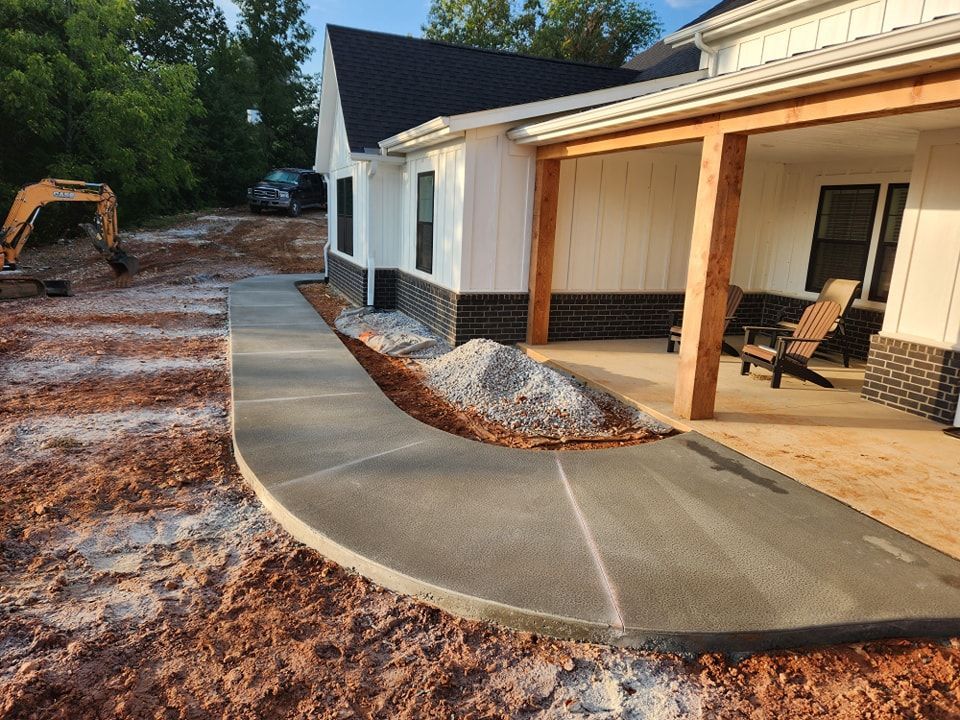 Concrete sidewalk installation before control joints are cut
