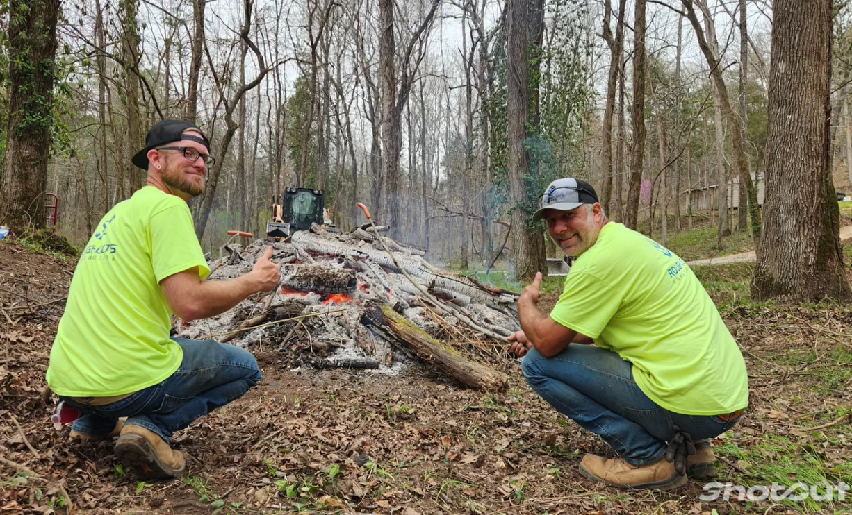 rough cuts construction out of Harrison, Arkansas burning brush they cleared