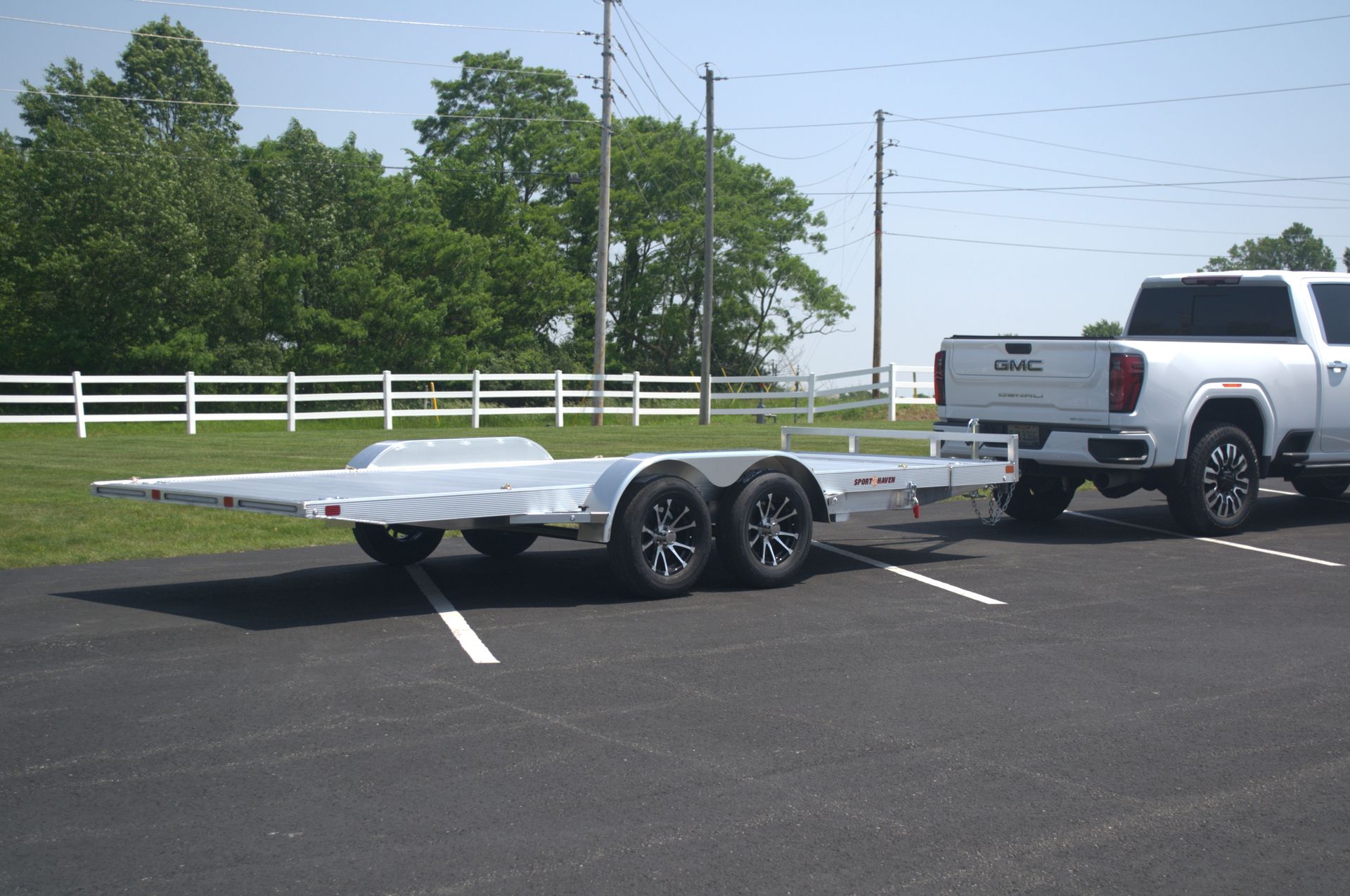 Tilt Car Hauler Trailer hooked to truck