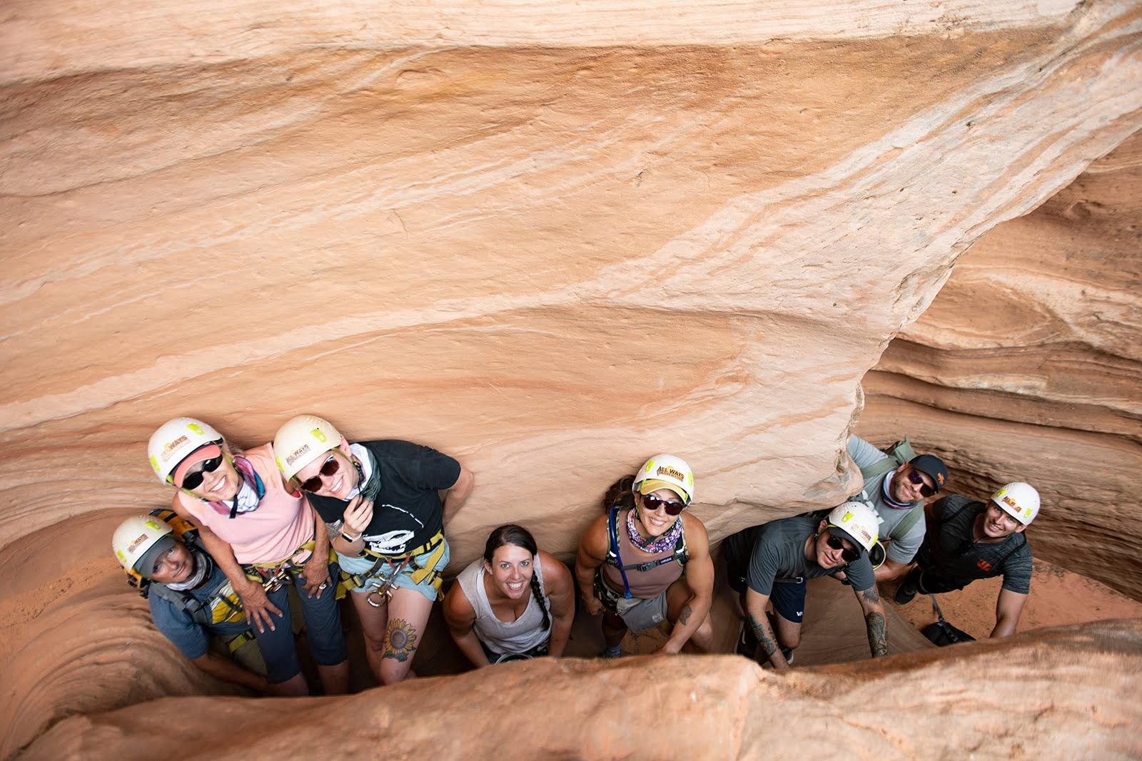 people in a canyon looking up