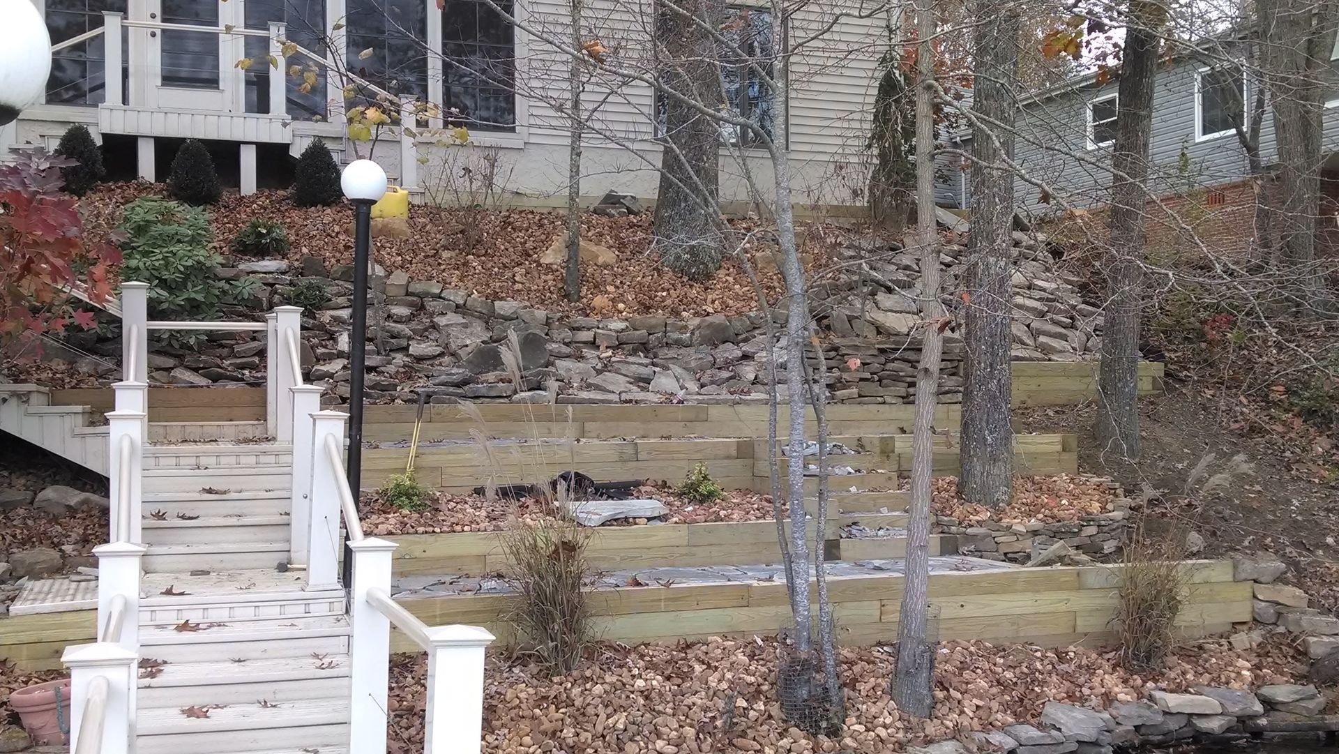 A house with a dock and stairs leading up to it
