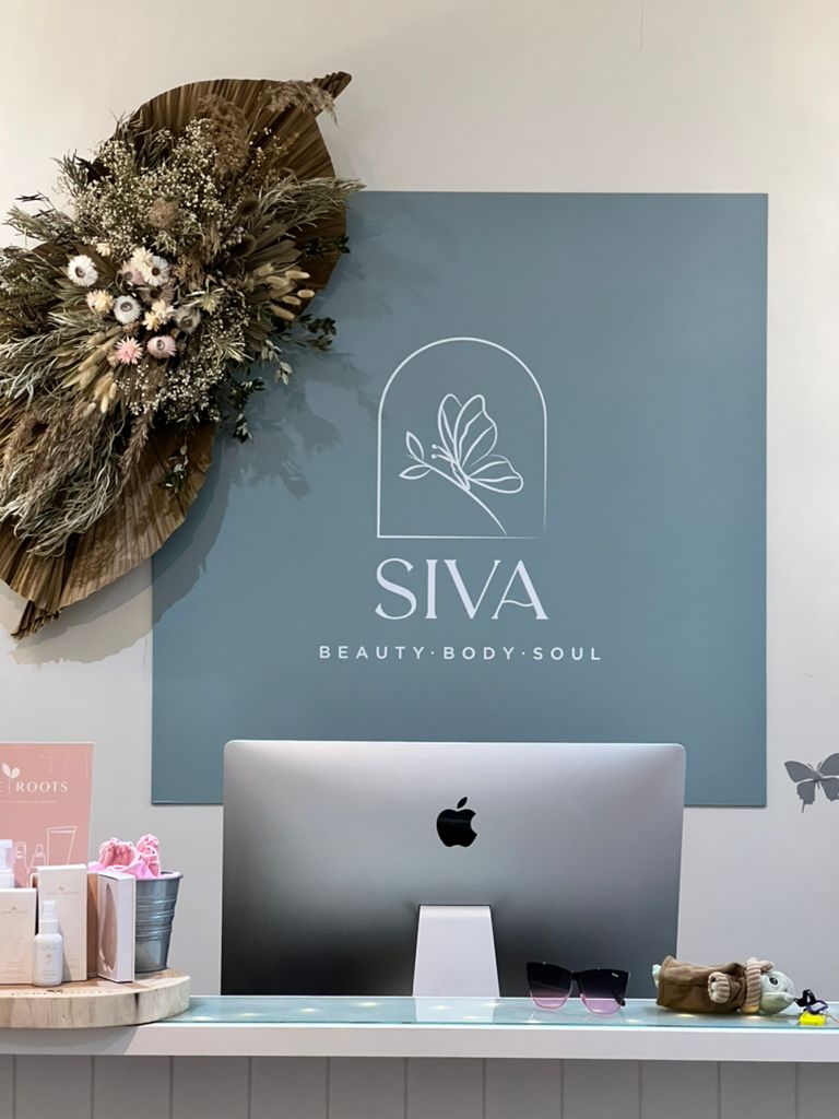 Reception desk with logo of