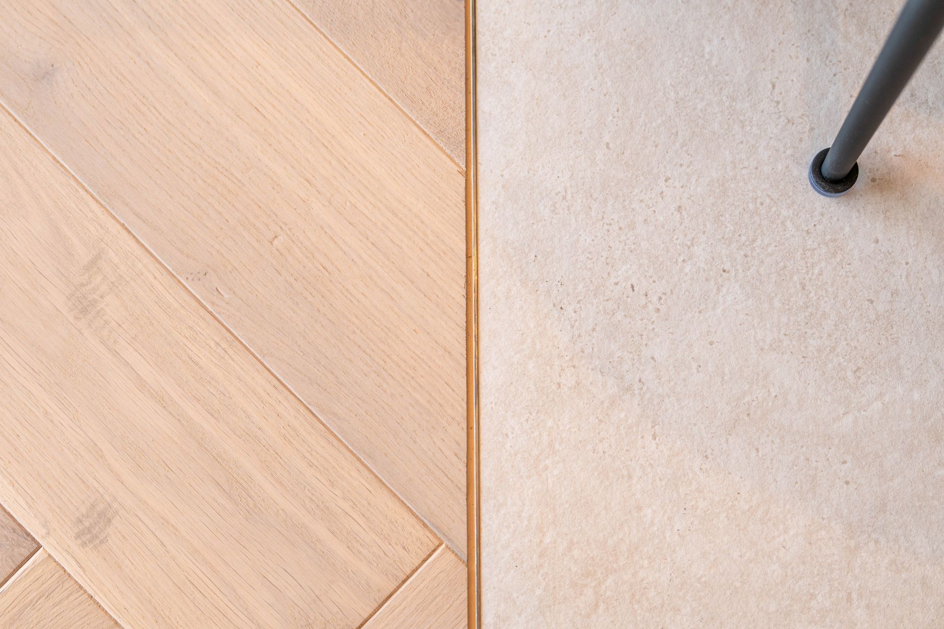 Woodlike luxury vinyl plank and concrete tile transition in modern design
near Myrtle Beach, South C