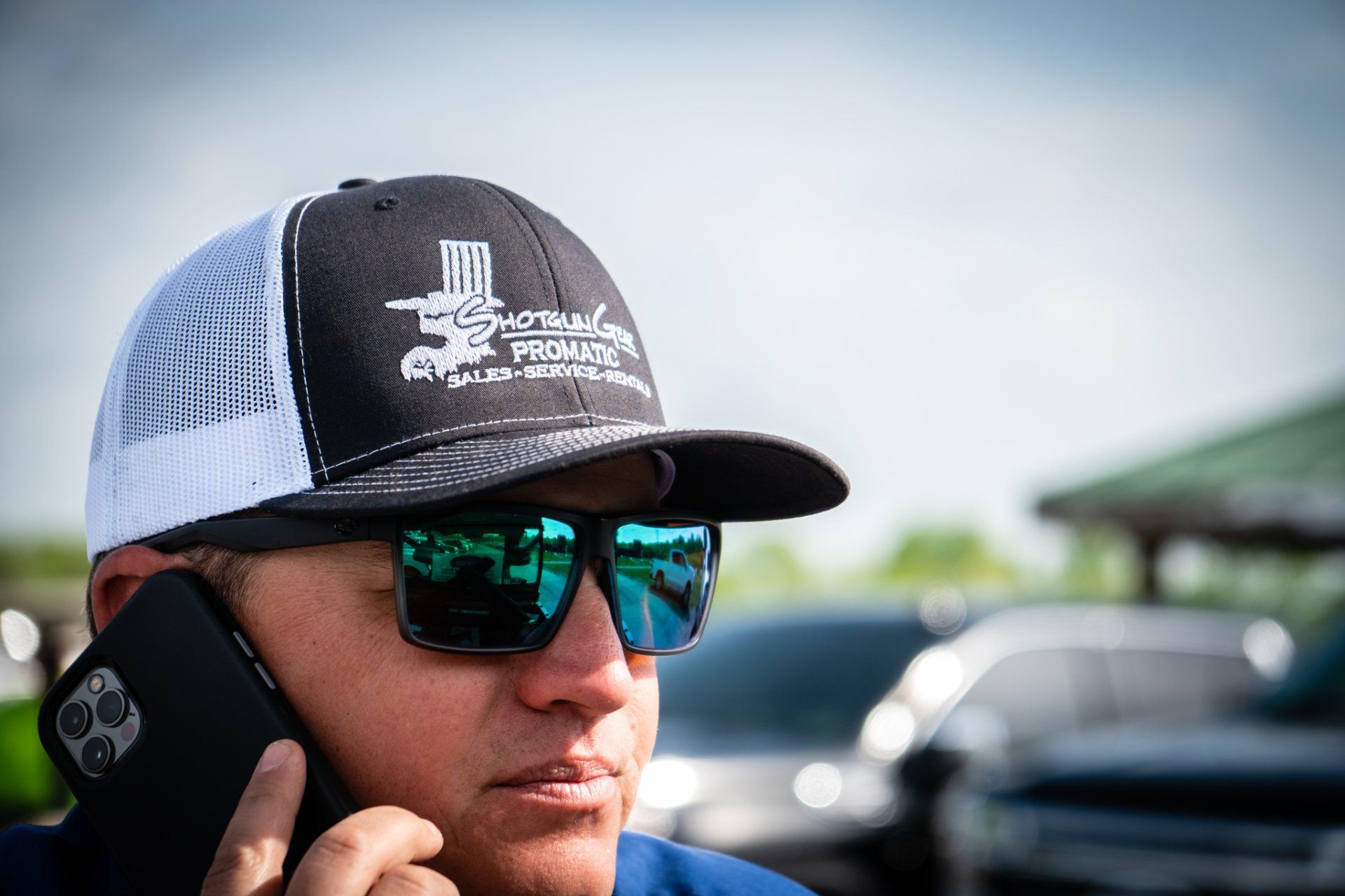 A shotgun gear employee on the phone
