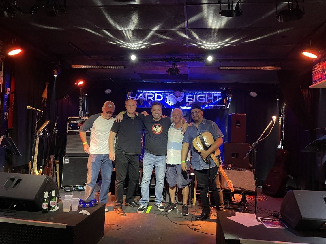 Band on stage with 