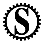Black gear icon with a white circle and a stylized letter “S” in the center
