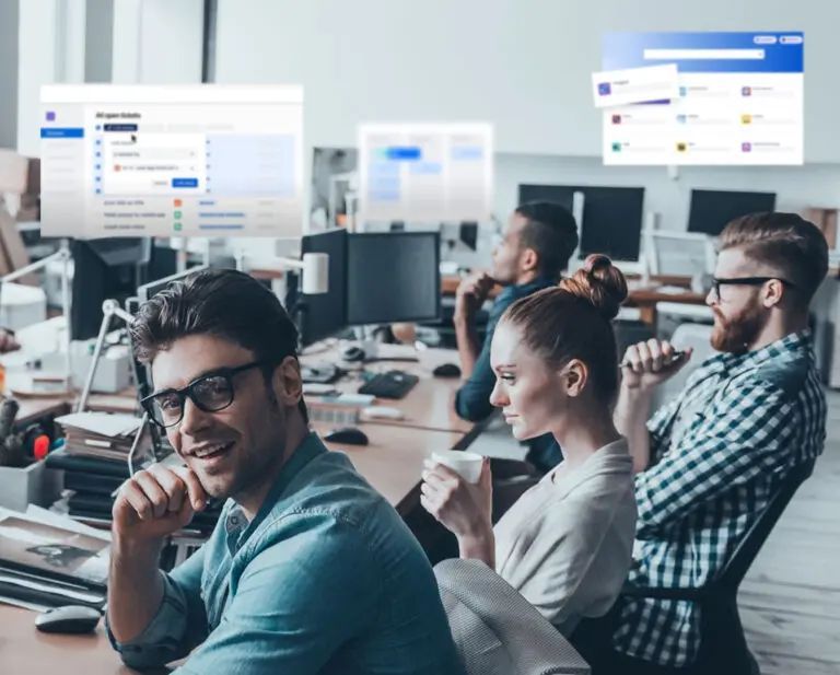 Office workers looking at computer screens, one smiling. Software UI displays in background.
