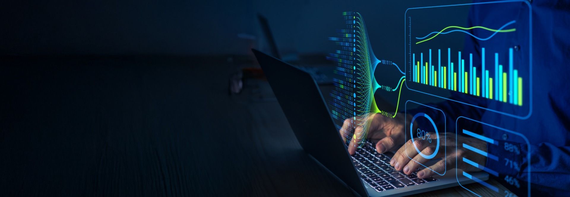 Person analyzing data on a laptop screen with charts and graphs.