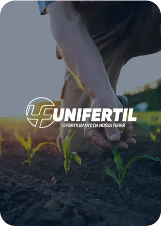 A person tending young crops in a field with the Unifertil logo.