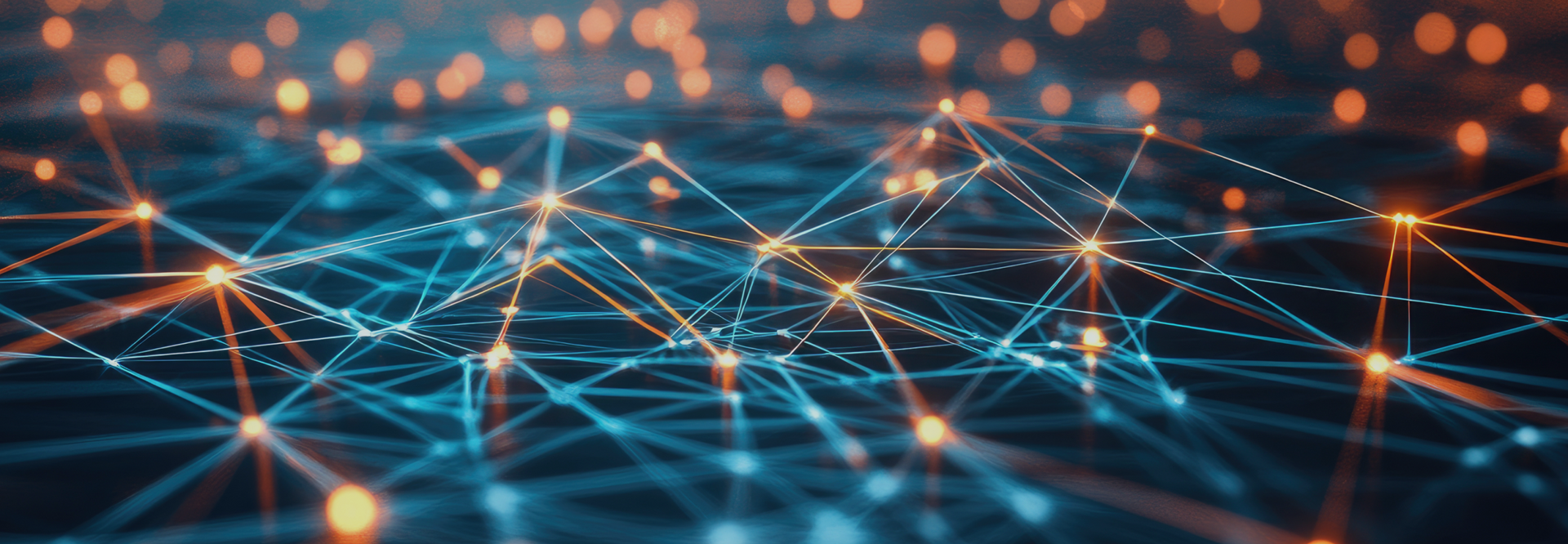 Abstract image of interconnected glowing orange and blue lights, representing a network or data flow.