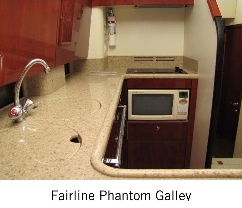 A picture of a kitchen with the words fairline phantom galley below it