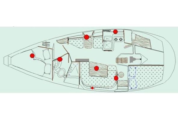 A floor plan of a boat with red circles on it.