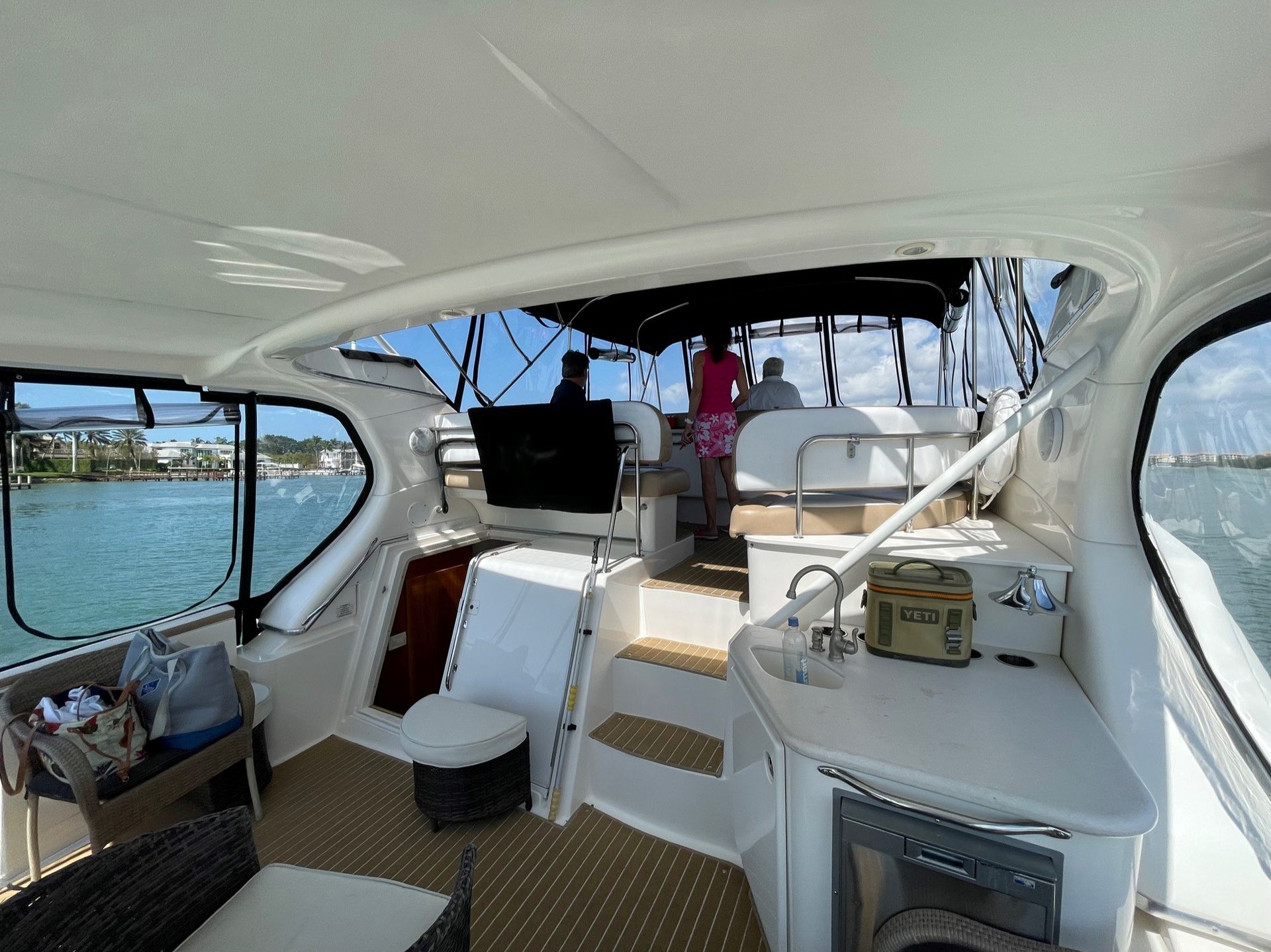 The inside of a boat with a few people on it