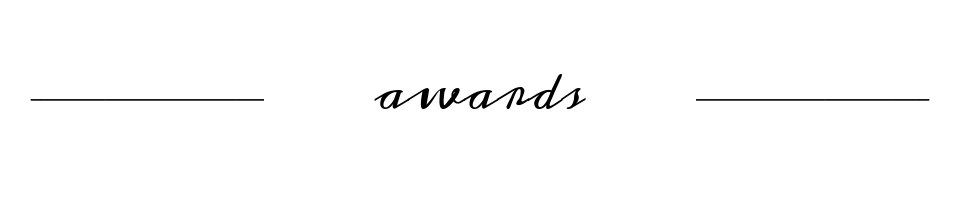 Decorative word “awards” in cursive, centered between two thin horizontal lines